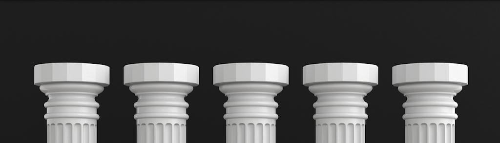 Five classical pillars on a computer, blur office background. 3d illustration